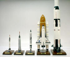 Grouping of 1/100 scale space models with Saturn V Rocket