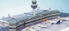 herpa - Airport Starter Set IV - Terminal - 1/500 Scale - HE510493 - The complete equipment for your airport in one go: this new starter set contains the two half-round departure halls (HE519823), two other terminal building two (HE519656), the tower (HE519670), the accessories set II with ground controllers, passengers, cars, barriers, helicopters, floodlight pylons, electricity aggregate, a cargo trailer, aluggage container, and a aircraft towing vehicle (HE519557), the car set (HE519915), eight models of smaller aircraft types from the regular sales collection, and an exclusive ground foil.