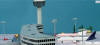 herpa - Airport Complete Set - Buildings - 1/500 Scale - HE516792 - With this new set, Herpa provides all the accessories for a stand-alone airport diorama. It contains a tower (519670), five gangways (519694), two departure halls (519649 and 519823), ten floodlight pylons (520171), and an airport foil sized 40 by 60 centimeters. The apron features parking positions for twelve model airplanes in the 1/500 scale.