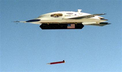 April  19, 2004 : X-45A (UCAV) Combat Drone : An X-45 aircraft releases an inert GPS-guided bomb Sunday at the Naval Air Warfare Center Weapons Division range in China Lake, California.