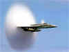 A jet at Mach One over the sea breaking the sound barrier!.